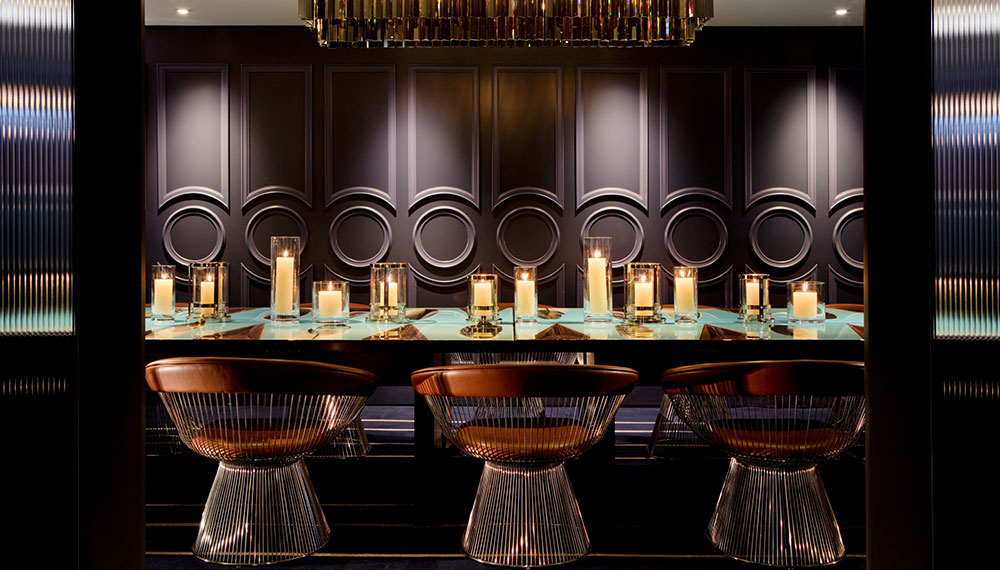 Private dining set-up in houndstooth boardroom