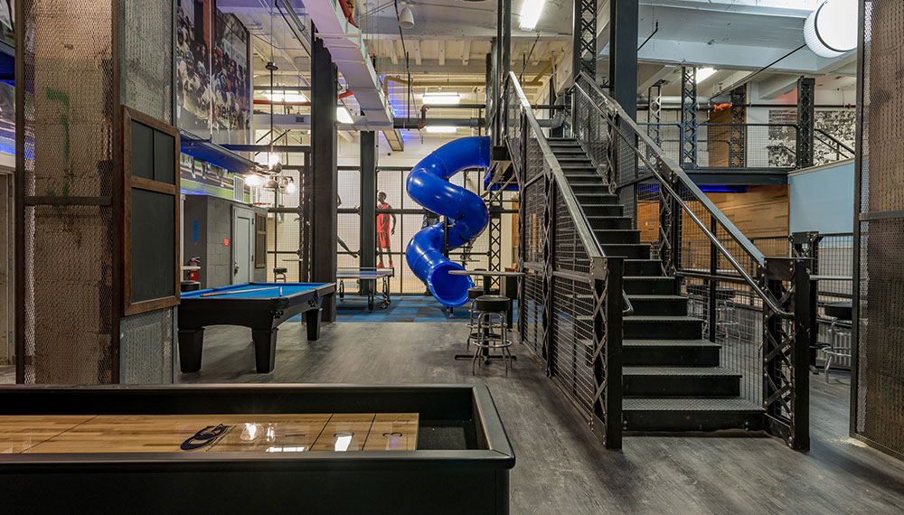 The Rec Room at Kimpton Cardinal Hotel with slide, pool table and more