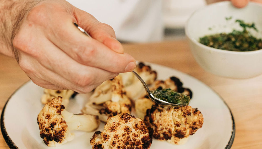 Chef plating a dish